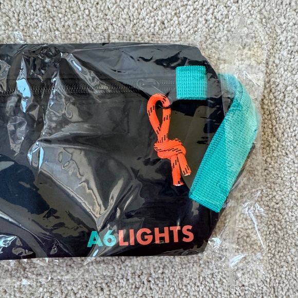 Lights A6 Exclusive VIP Merch Item Wristlet - Picture 3 of 5